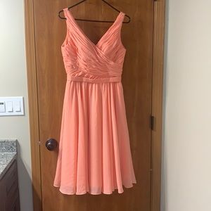 Women’s size 6 peach chiffon dress.